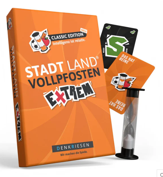 Das Bild zeigt die Spieleschachtel und Teile des Spielmaterials.